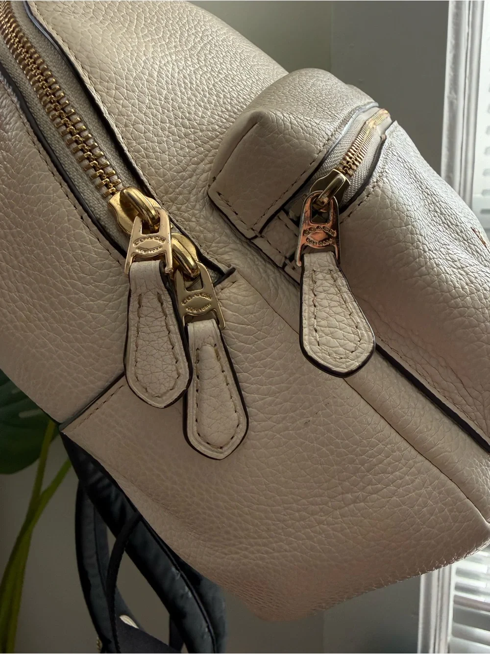 Coach Ivory Pebbled Backpack with Zipper Accent and Zip Closure